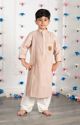 Pintucks Kurta Set with Solid Color with a lion zardozi embroidered patch - Beige